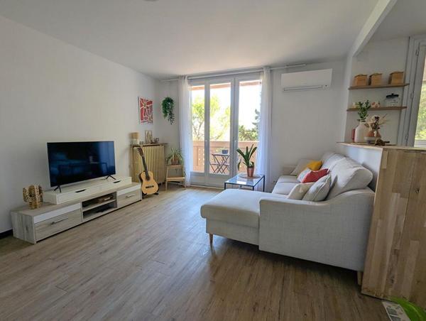 Appartement T4 - 67.52m² - 3 chambres - climatisation - balcon - loggia - garage - cave