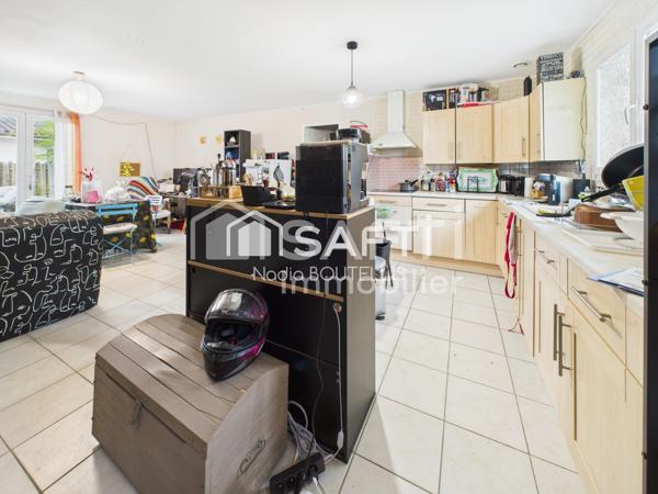 Maison de plain-pied, jardin, proche du centre.