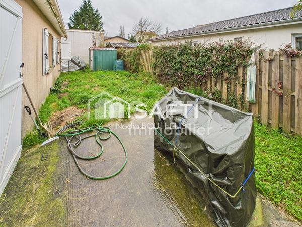 Maison de plain-pied, jardin, proche du centre.