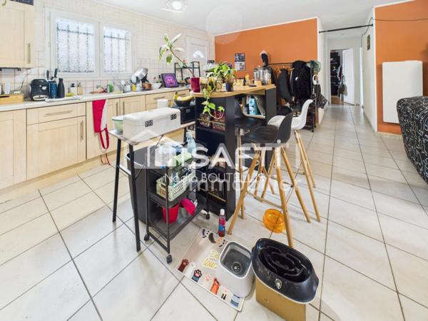 Maison de plain-pied, jardin, proche du centre.