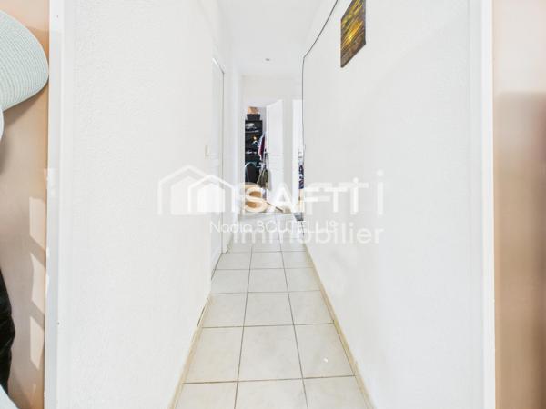 Maison de plain-pied, jardin, proche du centre.