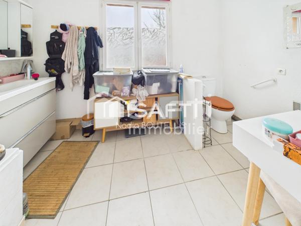 Maison de plain-pied, jardin, proche du centre.