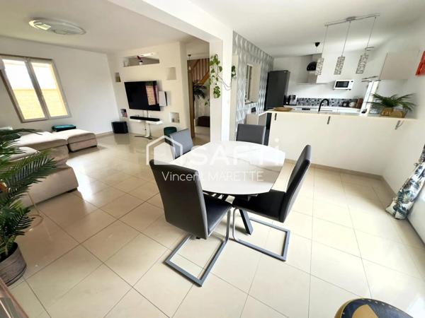 Maison familiale avec jardin, garage et confort moderne