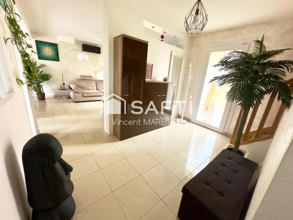 Maison familiale avec jardin, garage et confort moderne