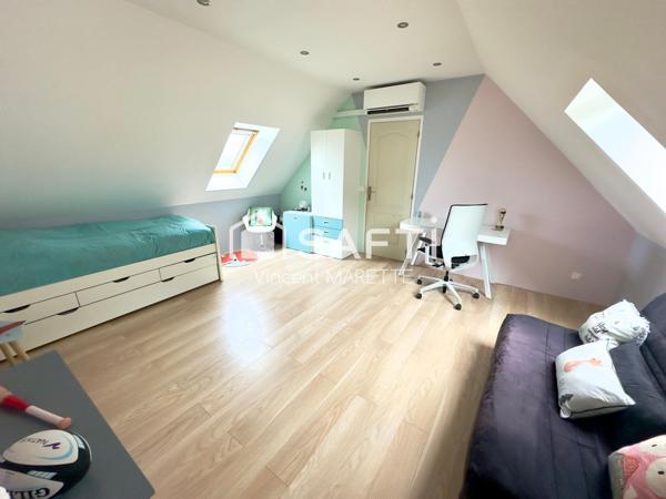 Maison familiale avec jardin, garage et confort moderne