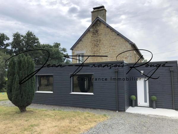 A trois kilomètres du centre de Tessy sur Vire, charmante maison en pierres rénovée d'une surface de 175 m² !!!