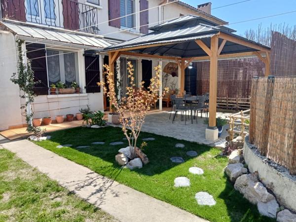 Maison T5 de 105m², 4 chambres, avec garage et jardin arboré
