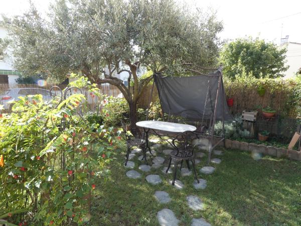 Maison T5 de 105m², 4 chambres, avec garage et jardin arboré