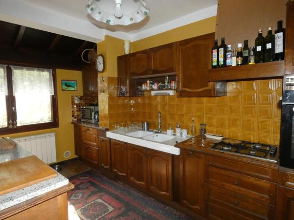 Maison T5 de 105m², 4 chambres, avec garage et jardin arboré