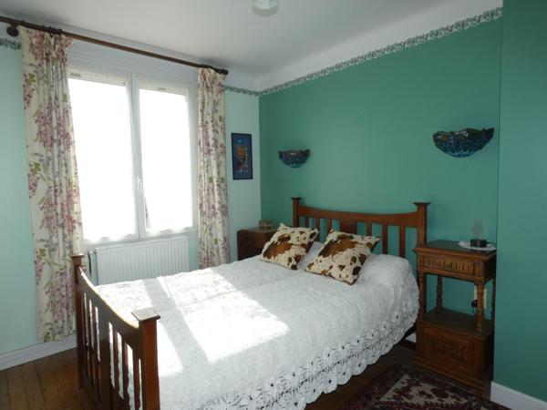 Maison T5 de 105m², 4 chambres, avec garage et jardin arboré