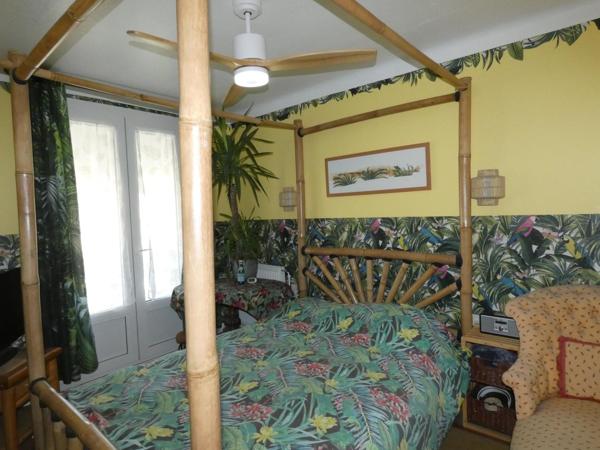 Maison T5 de 105m², 4 chambres, avec garage et jardin arboré