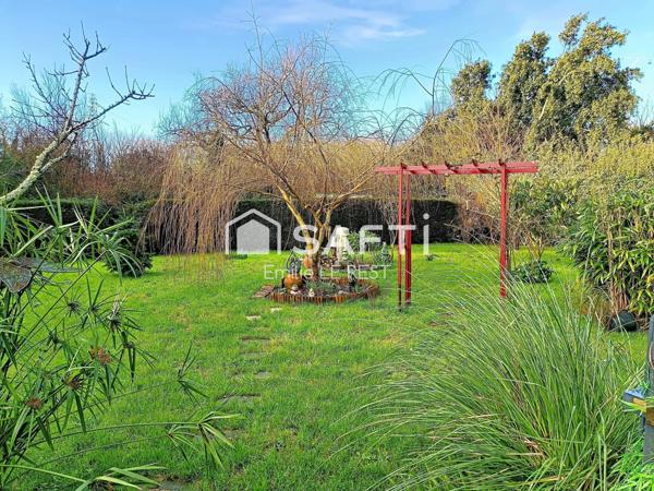 Une maison familiale au cœur d’un écrin de verdure