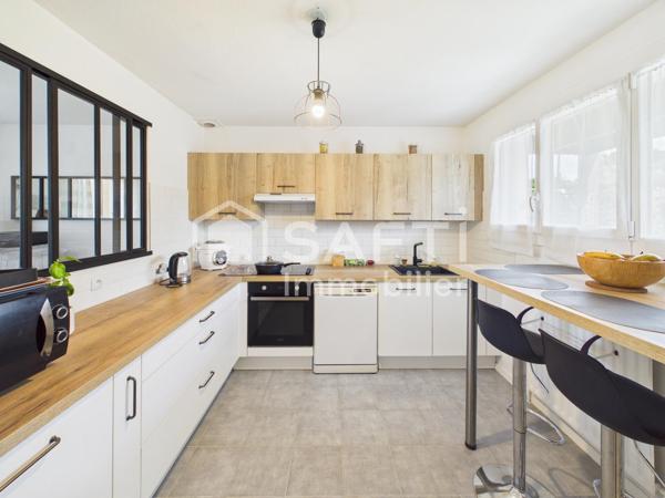 Maison familiale avec jardin, terrasse et garage