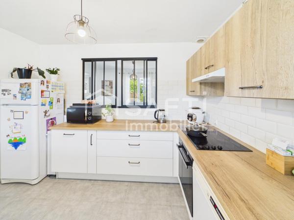 Maison familiale avec jardin, terrasse et garage