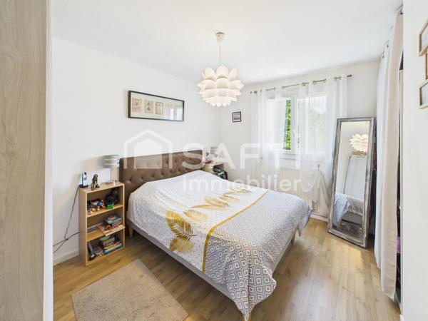 Maison familiale avec jardin, terrasse et garage