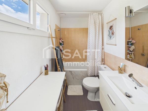 Maison familiale avec jardin, terrasse et garage