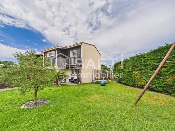 Maison familiale avec jardin, terrasse et garage