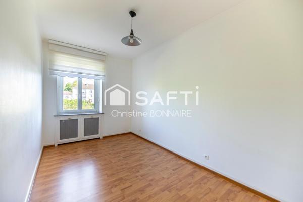 Appartement T4 de 94m² avec cave proche du centre ville et des ecoles