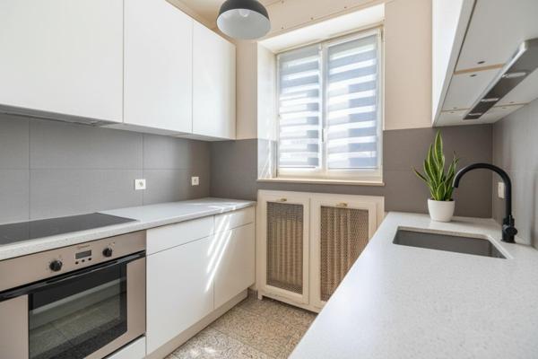 Appartement T4 de 94m² avec cave proche du centre ville et des ecoles
