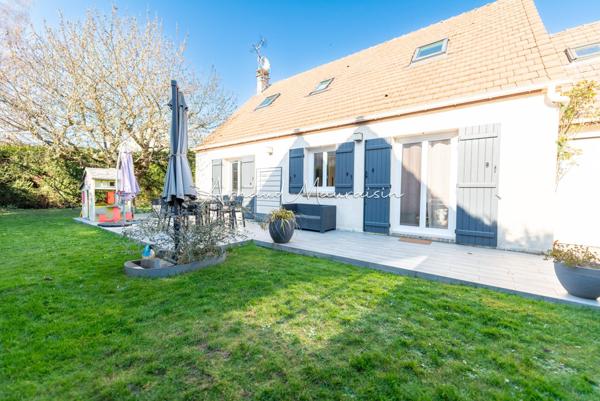 Maison fonctionnelle et lumineuse avec jardin