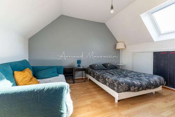 Maison fonctionnelle et lumineuse avec jardin