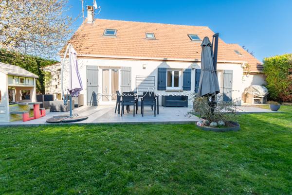 Maison fonctionnelle et lumineuse avec jardin