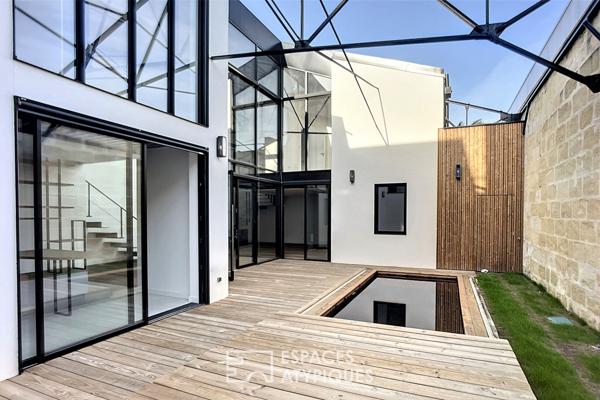 Loft sculptural avec terrasse et piscine aux Chartrons
