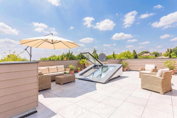 Maison contemporaine avec terrasse rooftop à Pouvourville