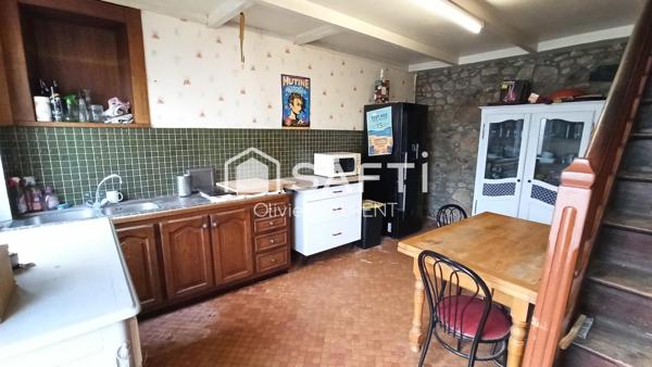 Grande maison de bourg en pierre