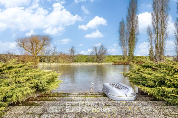 Propriété de caractère avec étang privatif