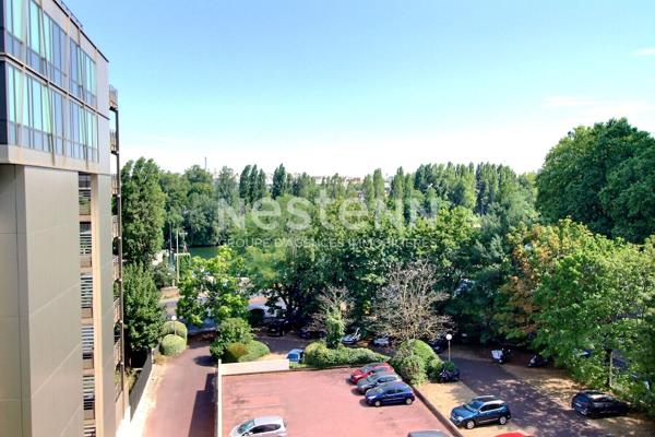 Appartement Courbevoie 1 pièce 21 m2 bonne rentabilité balcon DPE D aucun travaux vue Tour Eiffel parking