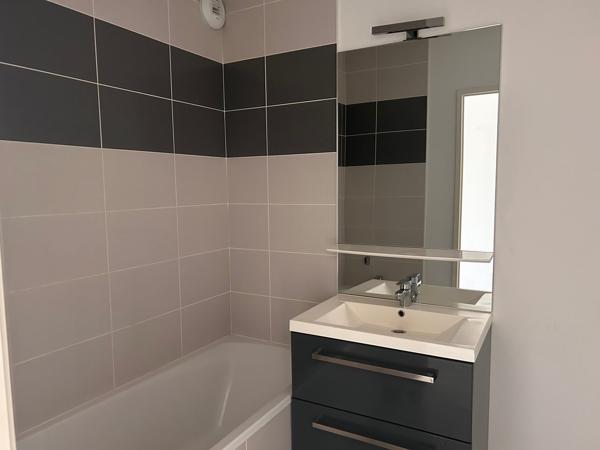 Appartement t3 terrasse et place de parking