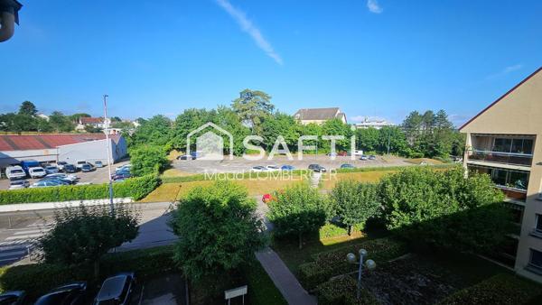 Appartement F3 - Résidence Charles Quint avec ascenseur, terrasse et garage.