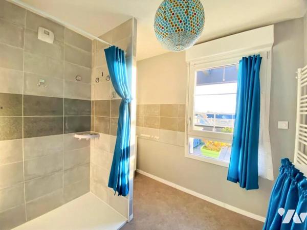 Appartement de standing avec grande terrasse au cœur de Plescop