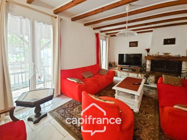 Maison de charme avec beau parc, 3 chambres, grande terrasse couverte et appartement indépendant, coeur du village