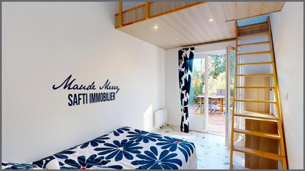 Villa plain-pied de 120 m2 + dépendance de type T2 de 26 m2 - garage - terrain plat et arboré de 2000 m2 - assainnissement individuel aux normes - calme et sans vis-à-vis