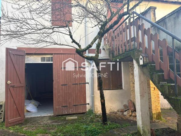 IMMEUBLE MITOYEN A RENOVER AVEC JARDIN ET GARAGE