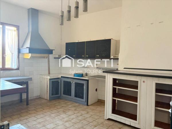 IMMEUBLE MITOYEN A RENOVER AVEC JARDIN ET GARAGE