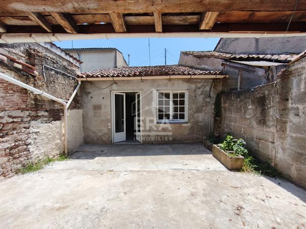 Maison de ville prête à vivre avec cour couverte et espace extérieur préservé