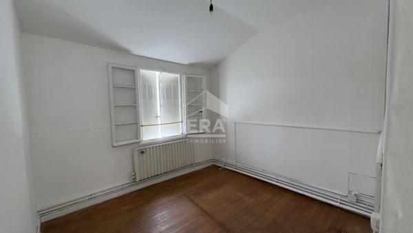 Maison de ville prête à vivre avec cour couverte et espace extérieur préservé