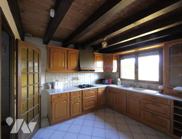 Maison sur grand terrain constructible