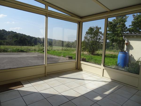 Plélauff (22570) Maison de village avec jardin, garage et vue dégagée – un potentiel à révéler au cœur de Plelauff