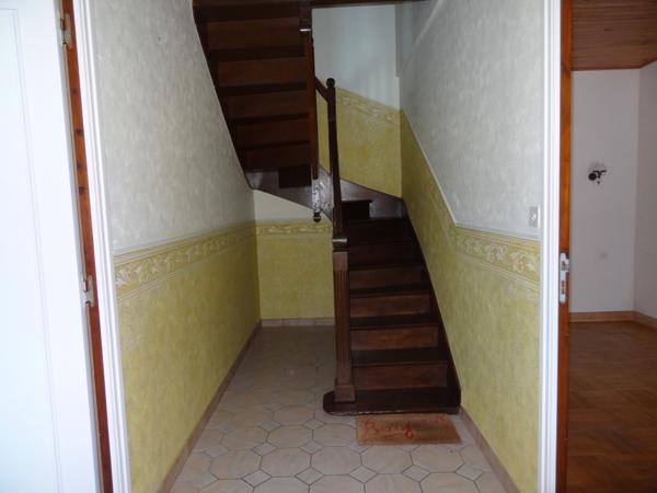 Plélauff (22570) Maison de village avec jardin, garage et vue dégagée – un potentiel à révéler au cœur de Plelauff