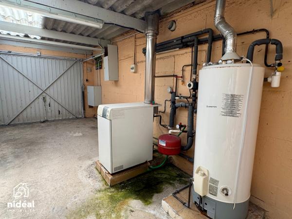 Masion semi-individuelle avec garage et jardin à améliorer