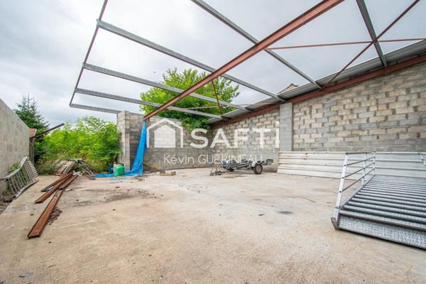 Terrain de 571 m2 avec hangar pour habitation ou activité pro