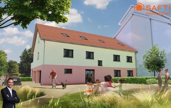 Superbe appartement de 83,72m² disposant d'une terrasse, d'un jardin, d'un double garage et de 2 places de stationnement privées !