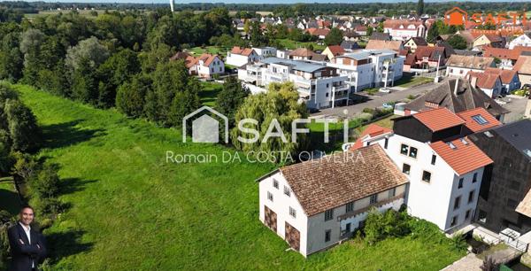 Superbe appartement de 83,72m² disposant d'une terrasse, d'un jardin, d'un double garage et de 2 places de stationnement privées !