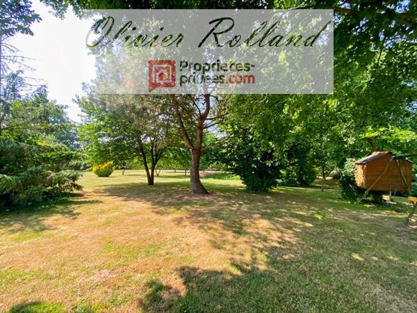 Magnifique longère rénovée avec goût au coeur d'un superbe parc