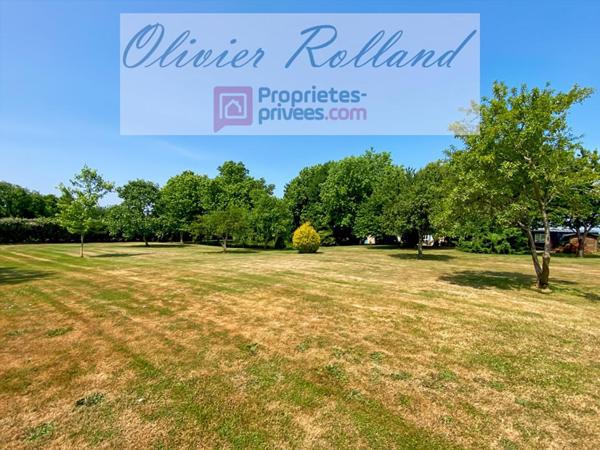 Magnifique longère rénovée avec goût au coeur d'un superbe parc