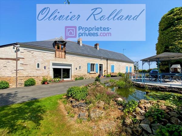 Magnifique longère rénovée avec goût au coeur d'un superbe parc